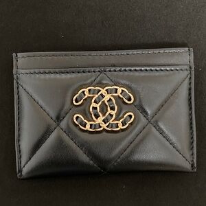 CHANEL Quilted Black Card Holder with Gold Emblem